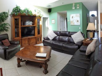 Family Room Couches, Recliner and Big Screen TV