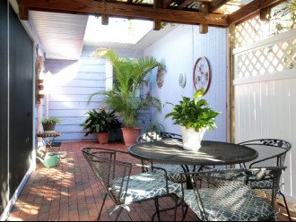 Your private outdoor brick patio living space.