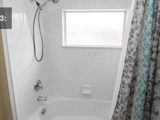 Bathroom with shower and bath