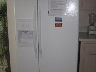 Kitchen refrigerator with ice maker and filtered water