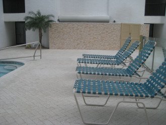 Chairs all around the pool