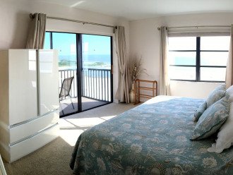 Master Bedroom with views of the ocean and back bay