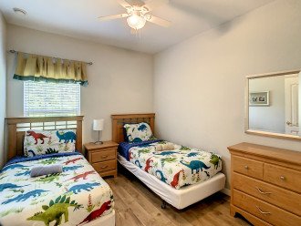 The 1st twin bedroom with 2 full size twin beds