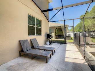 Patio loungers and BBQ grill