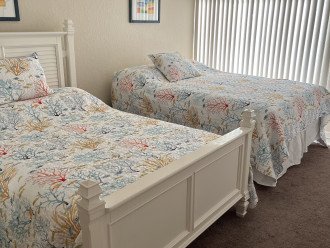Queen and full bed in guest bedroom