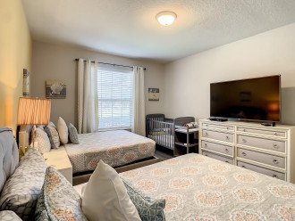 First floor queen suite with 2 queen beds and crib