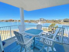 Breath-taking views of Sabine Bay from this beautifully decorated townhome!