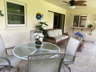 Large screened lanai with full size patio table and sofa