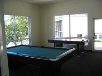 Pool table and air hockey at club house