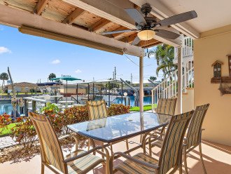 Sit waterside at your covered back deck area and watch boats and dolphins.