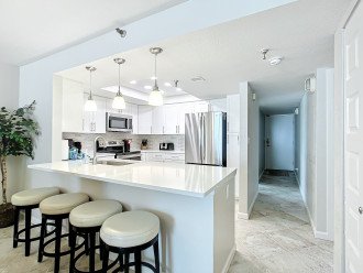 Socializing while cooking is easy in this condo