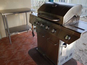 Prepare Your Catch on the Stainless Steel Prep Table and Deluxe Grill