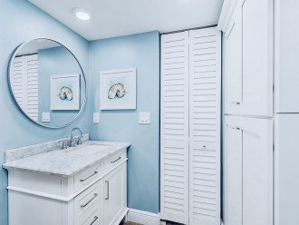 Ensuite bathroom w/access from the living room, two vanities & walk-in closet