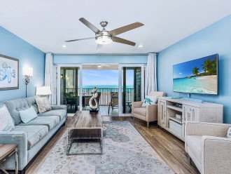 Open concept contemporary design and an exquisite beachfront view.