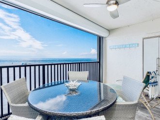 Private lanai w/super screen, dining for four, beach supplies and a lounger.