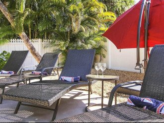 Lounge in or out of the sun w the umbrella to protect you. Beach towels incl.