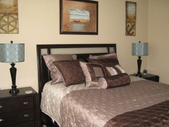 Your guests will thank you much for their queen bed comfort in this guest room