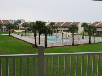 View of grounds and pool from patio