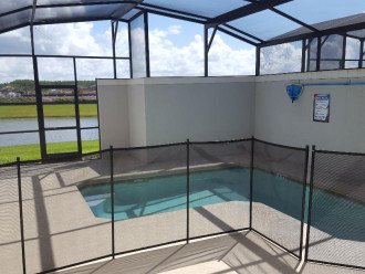 Private Patio Pool area screened in