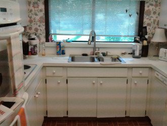 Kitchen - double ovens, cooktop, frig/freezer w/icemaker, microwave, dishwasher