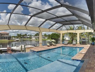 Caribbean Island Dolphin View:4Suites,5ZoneA/C-54 ft Pool/Spa,Dock 2min.to River #10