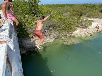 Short drive to this local swimming spot, guests jumping off bridge
