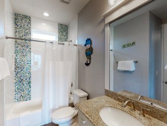 Shared Bathroom with a Shower/Tub Combo