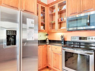 Updated Kitchen with granite tops, Stainless appliances and ample storage space