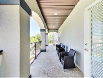 Third Floor Covered Porch Overlooking Pool Area to Relax and Unwind