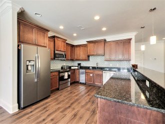 Fully Upgraded Gourmet Kitchen feat. Stainless Appliances
