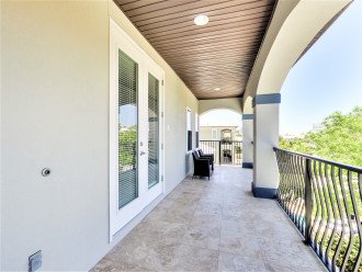 Third Floor Covered Porch Overlooking Pool Area to Relax and Unwind
