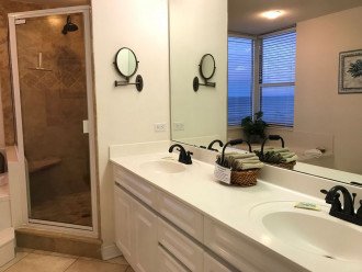 Master Bathroom w/Jacuzzi tub, travertine shower, magnifying mirror, hair dryer