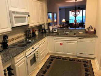 Kitchen is Outfitted with Granite Counter tops and a full set of Appliances