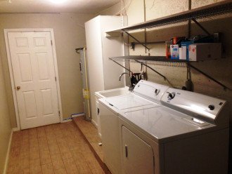 Laundry, Washer Dryer, Storage off hallway behind kitchen