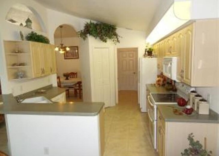 Kitchen with direct access to laundry room and large garage