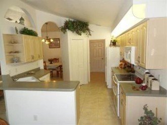 Kitchen with direct access to laundry room and large garage