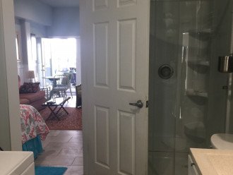 Bathroom with shower only. Washer and dryer.