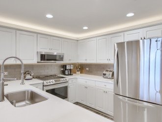 High-end appliances and fully stocked kitchen