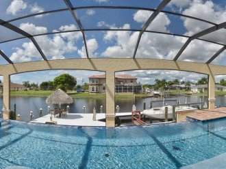 Caribbean Island Dolphin View:4Suites,5ZoneA/C-54 ft Pool/Spa,Dock 2min.to River #1
