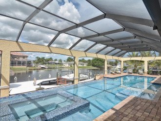 Caribbean Island Dolphin View:4Suites,5ZoneA/C-54 ft Pool/Spa,Dock 2min.to River #1