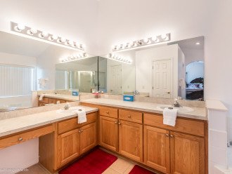 Master Bathroom with his & Vanities and closets