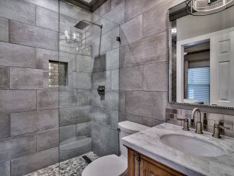 Guest bathroom with walk-in shower. Also accessible from living room