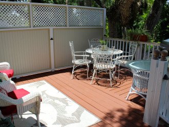 The privacy wall insures total privacy! Deck features subtle nighttime lighting