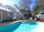 Your private heated pool is very secluded. The back yard is completely fenced.