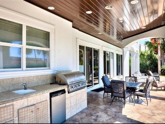 Outdoor Summer Kitchen With Plenty of Seating