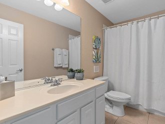 Bathe or shower in peace in the ensuite bathroom to the upstairs king bedroom.