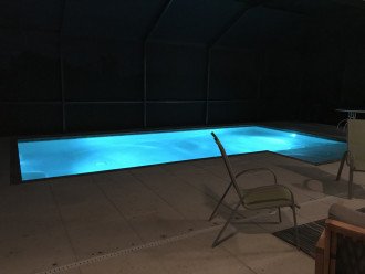 Pool lights beckon a nighttime swim