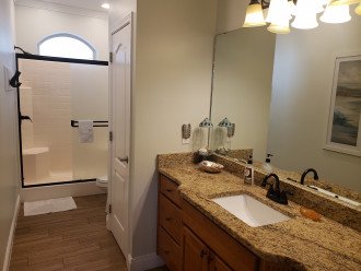 First floor master onsuite bath with walk in shower and upgraded amenities.