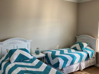 Freshly painted room with 2 TWIN beds and a QUEEN sleeper