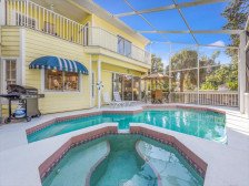 Villa Champagne | Pet Friendly Canal Front Home w / Private Pool & Spa